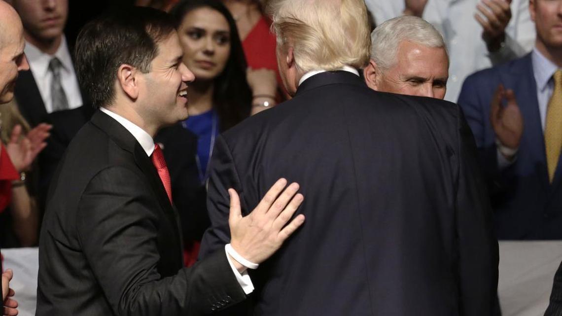 Sen. Marco Rubio, R-Fla., left, walks off the stage with President Donald Trump after a speech where Trump a revised Cuba policy aimed at stopping the flow of U.S. cash to the country's military and security services while maintaining diplomatic relations, Friday, June 16, 2017, in Miami.