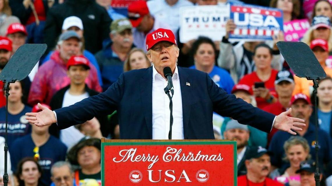 In this Dec. 17, 2016, photo, President-elect Donald Trump speaks during a rally at the Ladd Peebles Stadium in Mobile, Ala.