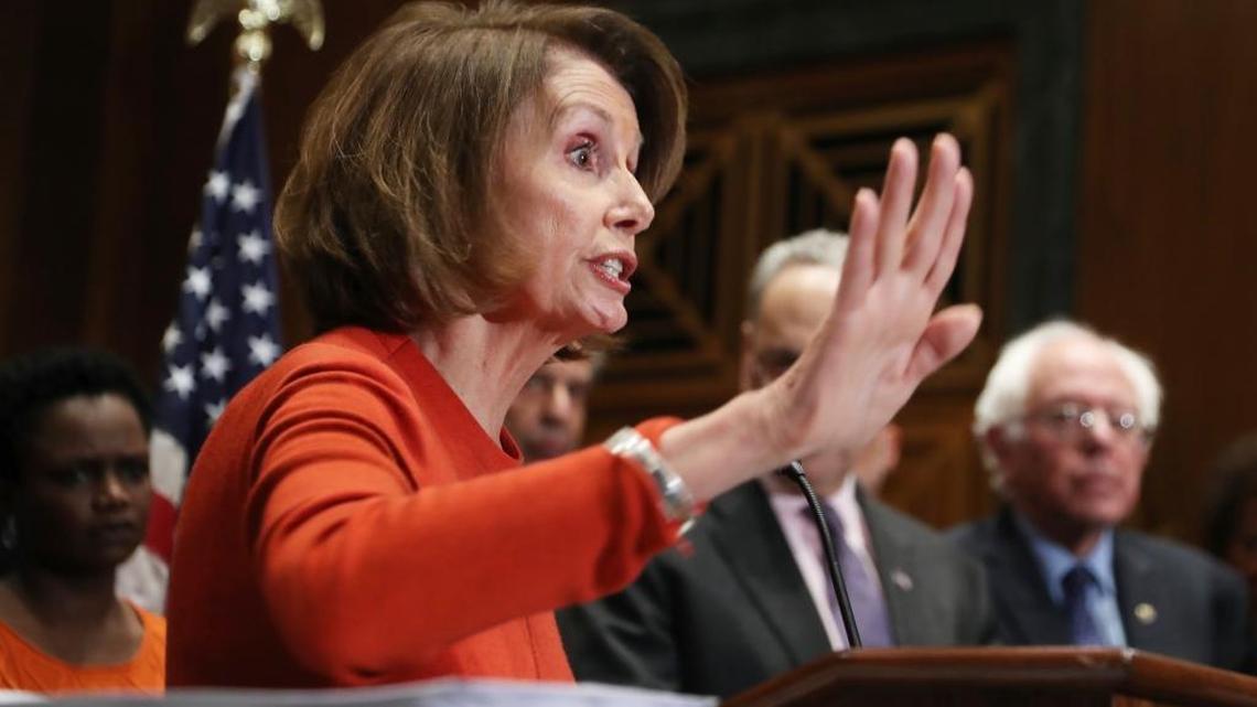 House Minority Leader Nancy Pelosi of Calif., with Sen. Bernie Sanders, I-Vt., right, speaks during a news conference on Capitol Hill in Washington, Wednesday, Dec. 7, 2016, to deliver over million petition signatures demanding that President-elect Donald Trump, House Speaker Paul Ryan, and Senate Majority Leader Mitch McConnell "keep their hands off the American people's earned Medicare benefits."