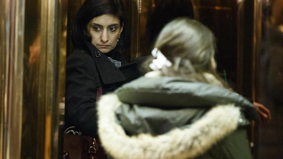 In this Jan. 10, 2017, file photo, Seema Verma, left, then President-elect Donald Trump's nominee for administrator of the Centers for Medicare & Medicaid Services, gets on an elevator in the lobby of Trump Tower in New York. Verma, the businesswoman selected by President Donald Trump to oversee Medicaid, the health care program for 74 million low-income Americans, has said the program is structurally flawed at its core by policies that burden states and foster dependency in the poor.