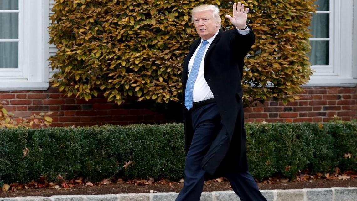 President-elect Donald Trump waves as he arrives at the Trump National Golf Club Bedminster clubhouse, Sunday, Nov. 20, 2016, in Bedminster, N.J.