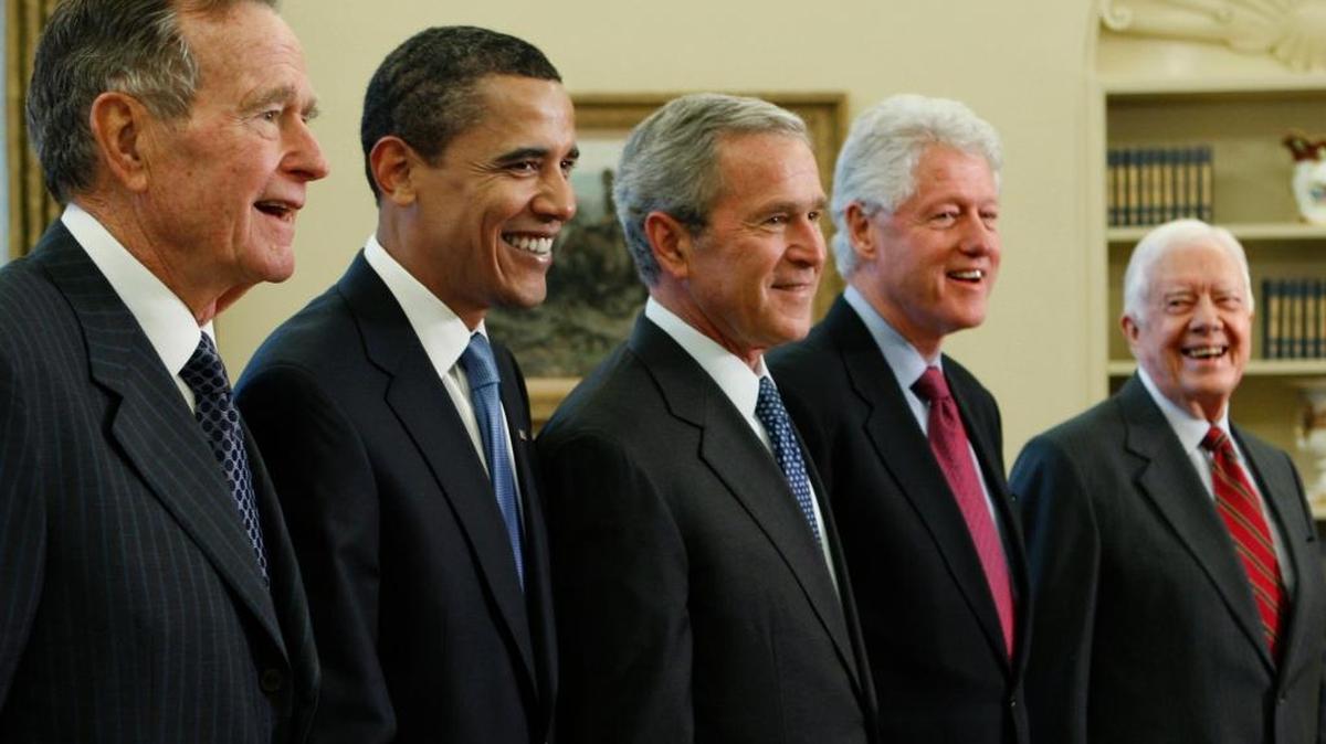 President George W. Bush, center, poses with President-elect Barack Obama, and former presidents, from left, George H.W. Bush, left, Bill Clinton and Jimmy Carter, right, Wednesday, Jan. 7, 2009, in the Oval Office of the White House in Washington.