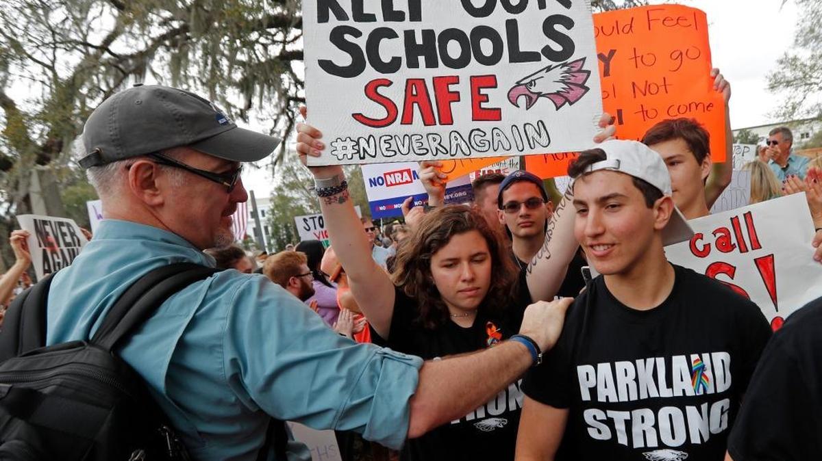 Student survivors from Marjory Stoneman Douglas High School are greeted as they arrive at a rally for gun control reform on the steps of the state Capitol in Tallahassee, Fla.