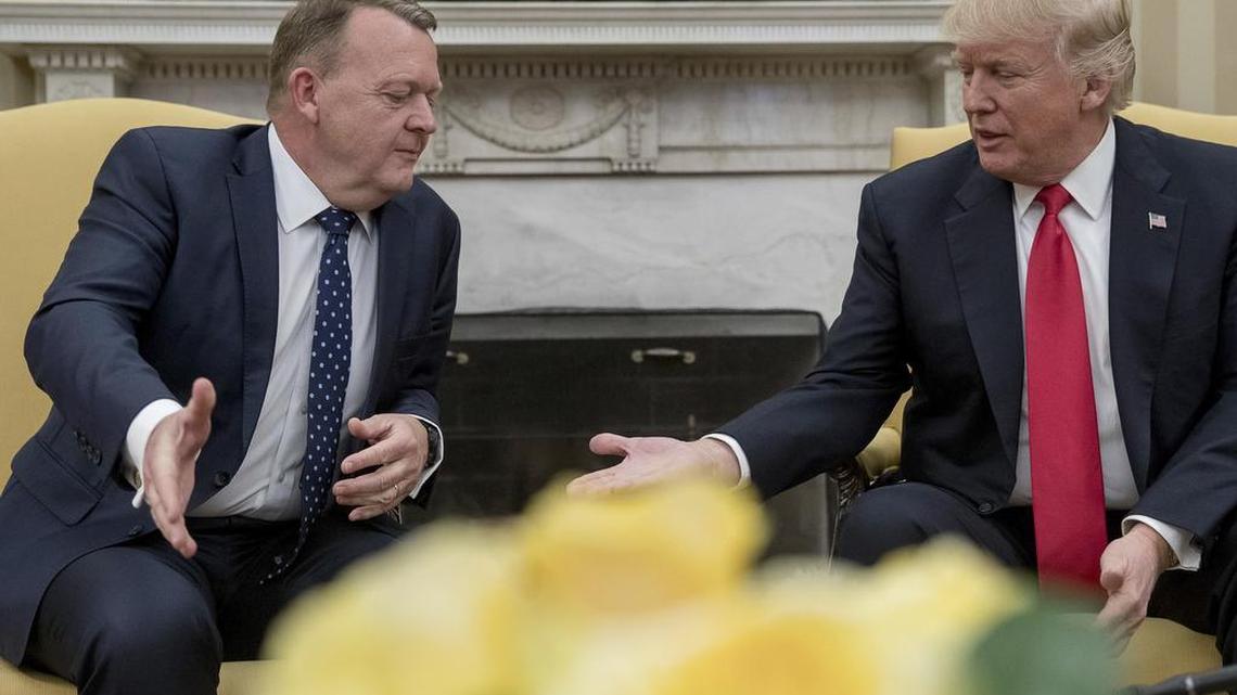 President Donald Trump and Danish Prime Minister Lars Lokke Rasmussen prepare to shake hands in the Oval Office at the White House in Washington, Thursday, March 30, 2017.