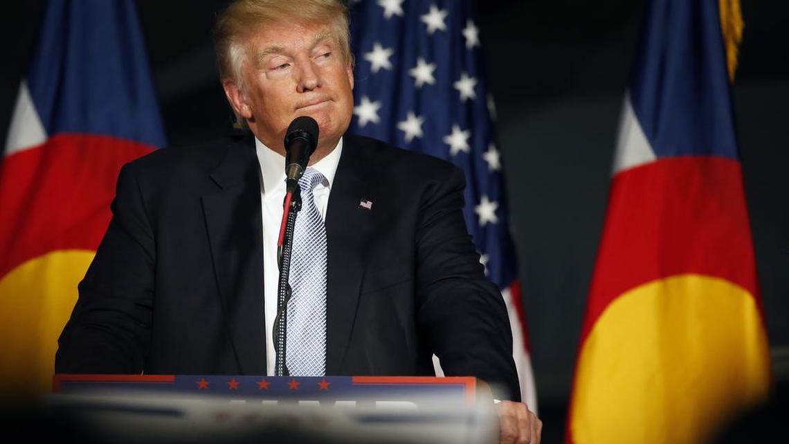 Republican presidential candidate Donald Trump pauses during a campaign rally at the Wings Over the Rockies Air & Space Museum, in Denver, July 29, 2016.