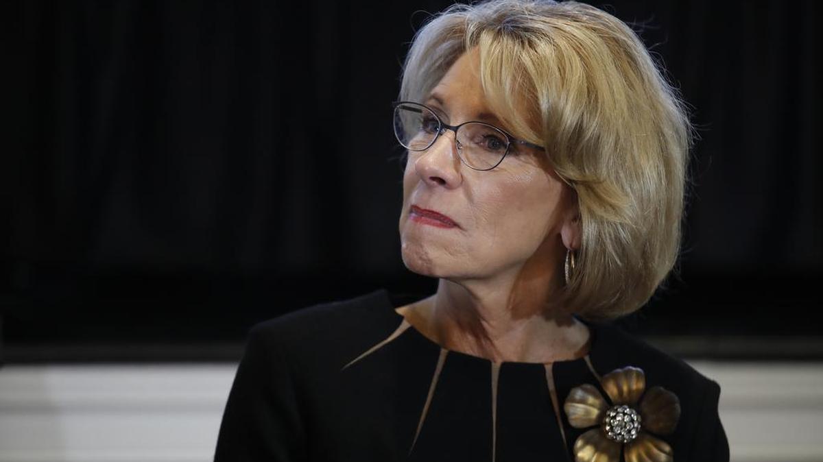 Education Secretary Betsy DeVos, listens to Vice President Mike Pence speak during a listening session with the historically black colleges and universities at the Eisenhower Executive Office Building.