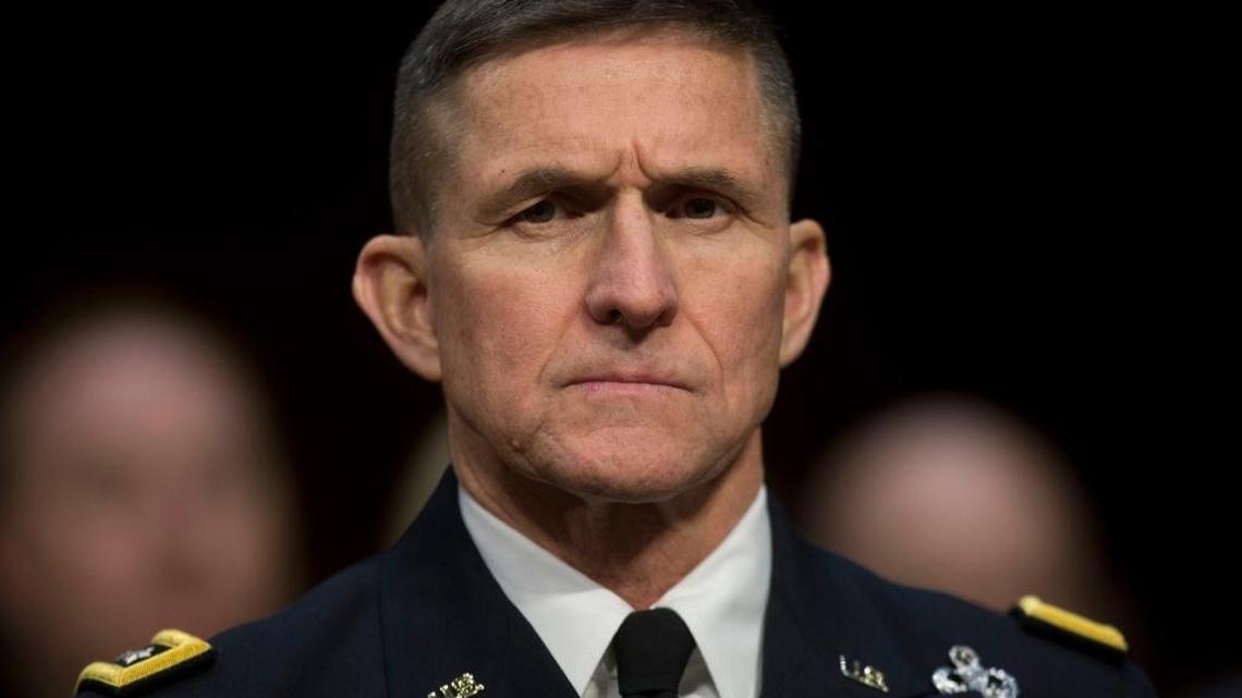 Defense Intelligence Agency Director Lt. Gen. Michael Flynn listens on Capitol Hill in Washington, Jan. 29, 2014, as he testifies before the Senate Intelligence Committee hearing on current and projected national security threats against the US.