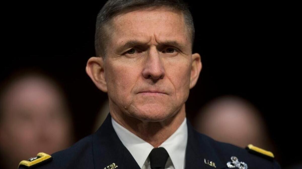 Defense Intelligence Agency Director Lt. Gen. Michael Flynn listens on Capitol Hill in Washington, Jan. 29, 2014, as he testifies before the Senate Intelligence Committee hearing on current and projected national security threats against the US.
