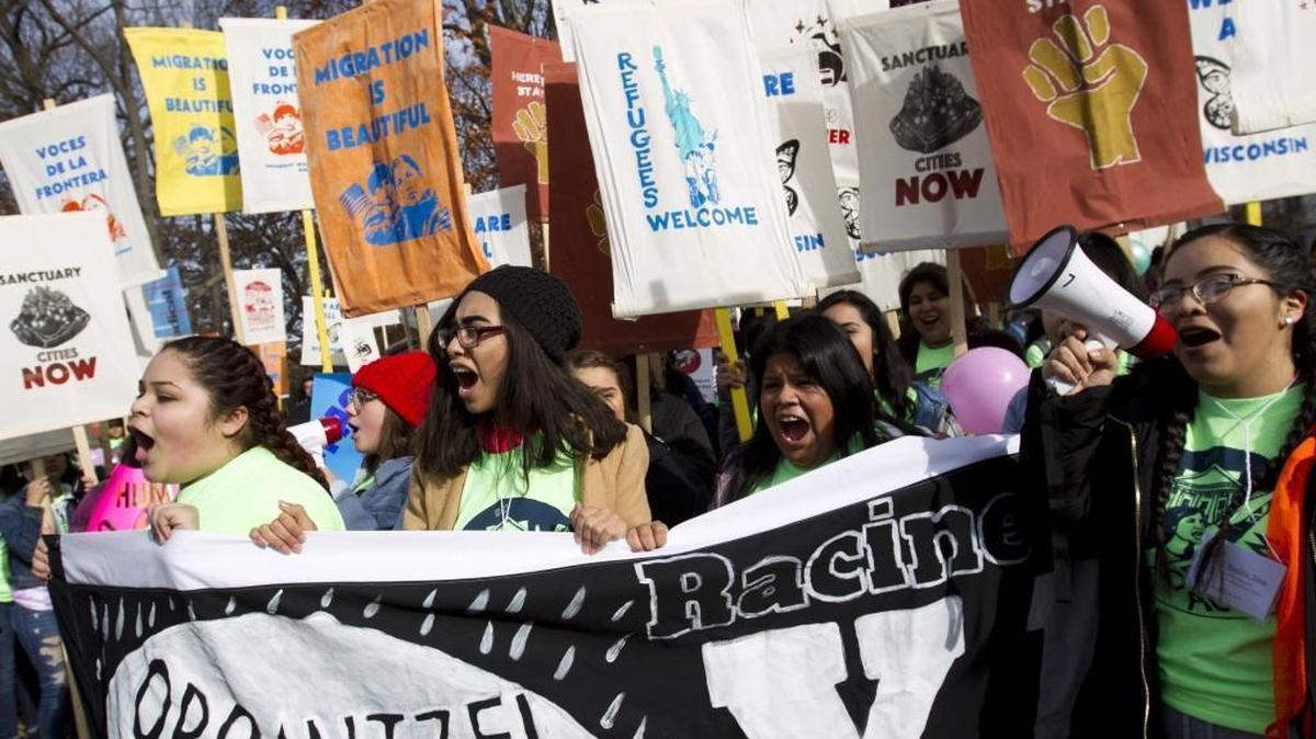 Demonstrators march during an immigration rally in support of the Deferred Action for Childhood Arrivals (DACA), and Temporary Protected Status (TPS), programs, on Capitol Hill in Washington.
