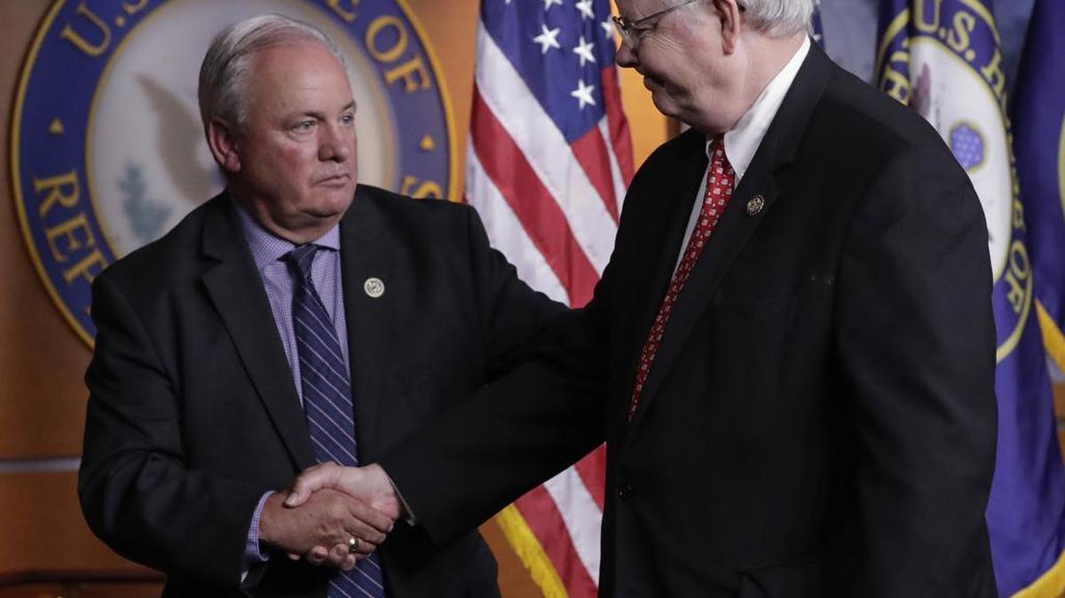 Rep. Mike Doyle, D-Pa., left and Rep. Joe Barton, R-Texas, managers of the congressional baseball teams, shake hands during a news conference on Capitol Hill in Washington, Wednesday, where they talked about the shooting of House Majority Whip Steve Scalise of La., and two Capitol Police officers in Alexandria, Va. during Congressional baseball practice.