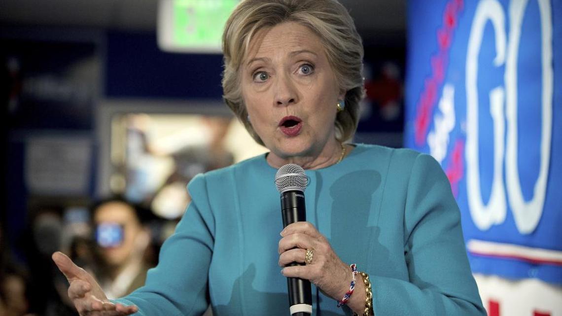 In this Oct. 14, 2016 file photo, Democratic presidential candidate Hillary Clinton speaks to volunteers at a campaign office in Seattle.
