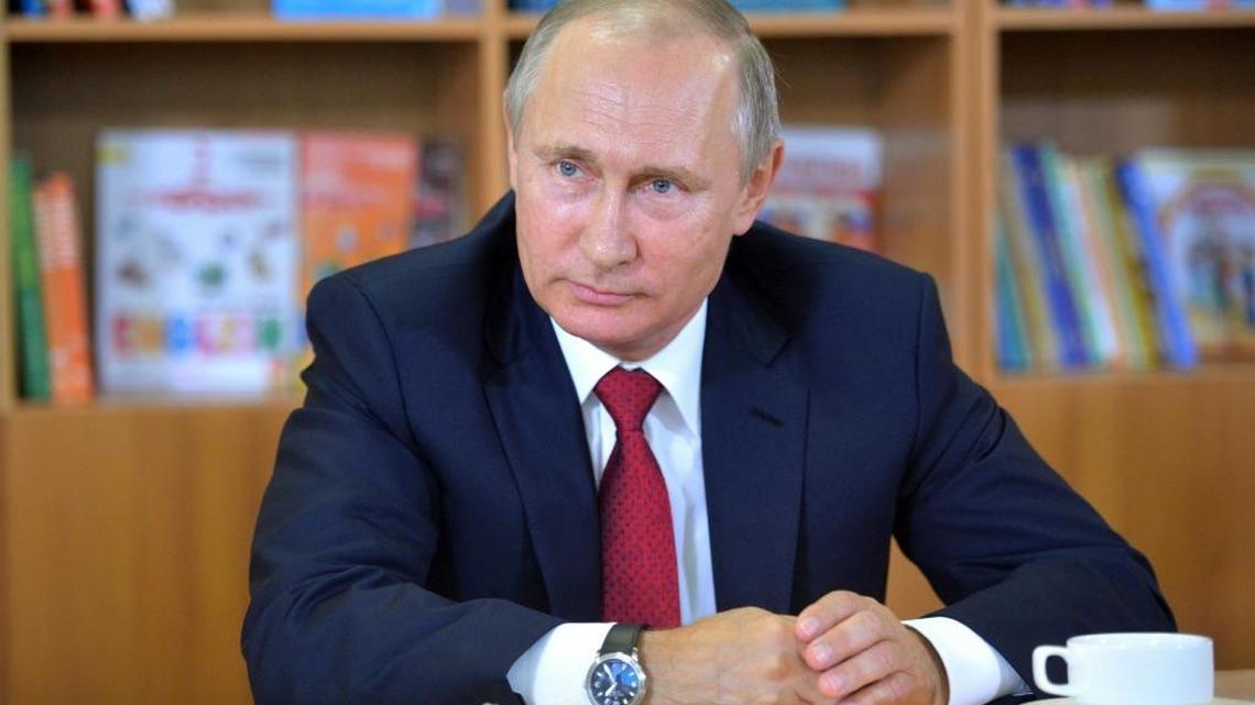 Russian President Vladimir Putin speaks prior to the beginning of the first lesson at a school at the Russian Pacific Ocean city of Vladivostok. On Thursday, Sept. 1, 2016, Putin told the Bloomberg news agency that Russia was not behind the hack of the Democratic National Committee in the United States.