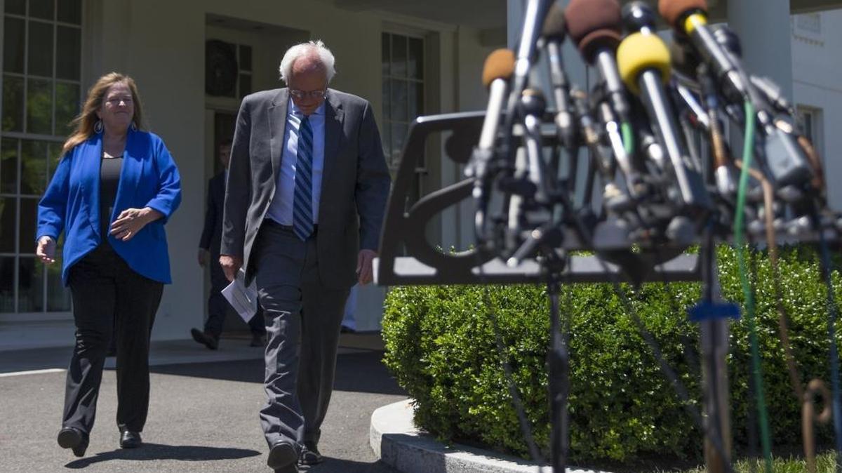 Democratic presidential candidate Sen. Bernie Sanders, I-Vt., and his wife Jane Sanders, walk to speak to reporters outside the White House in Washington, Thursday, June 9, 2016, following a meeting with President Barack Obama.