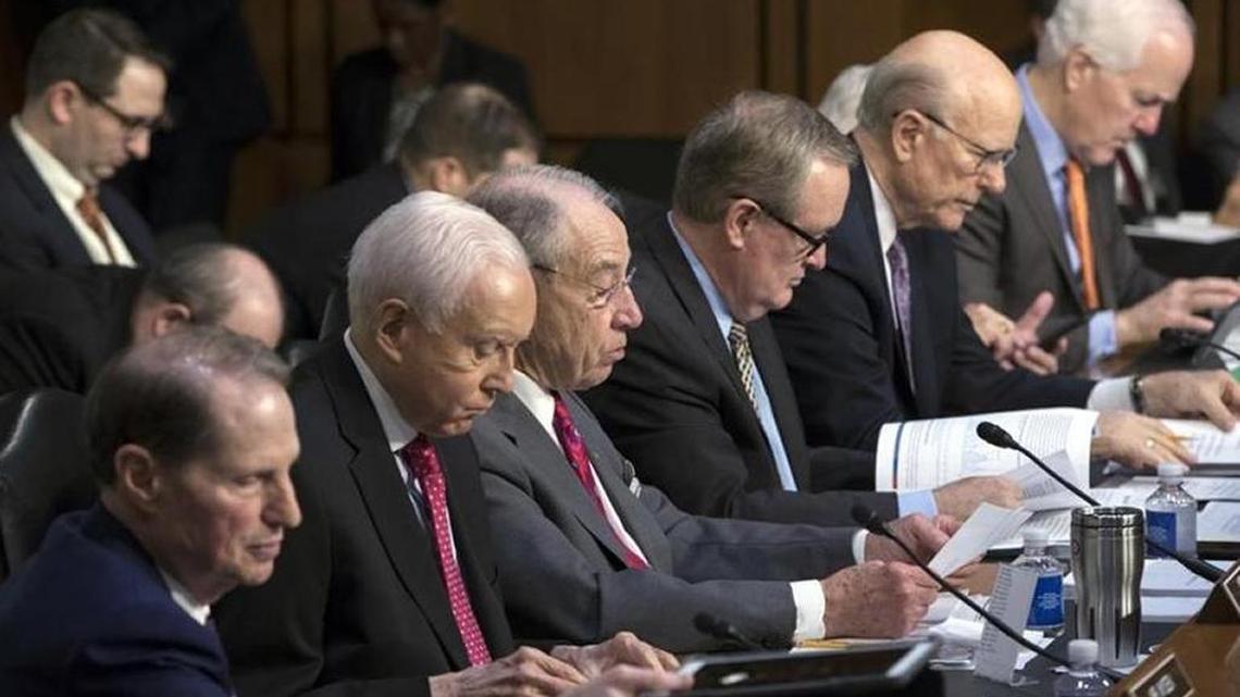 Members of the Senate Finance Committee consider the Republican tax overhaul legislation, which is now headed for debate by the full body on the Senate floor.