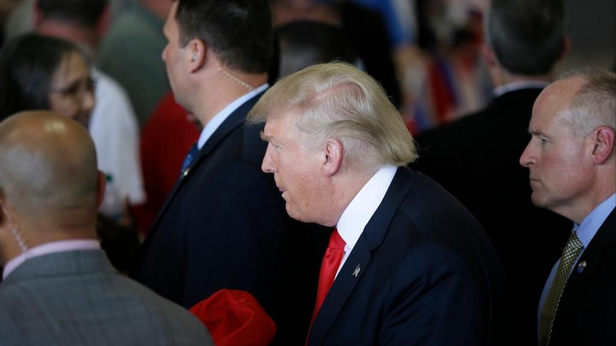 Republican presidential candidate Donald Trump greets supporters during a rally, Friday, May 6, 2016, in Omaha, Neb.