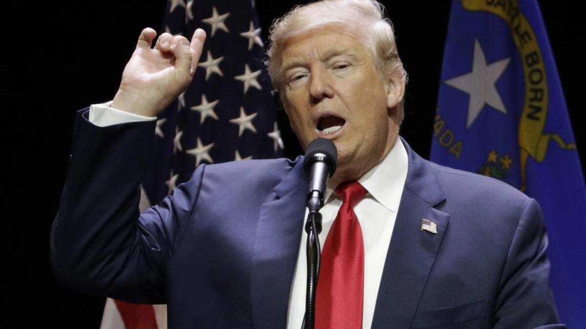 Republican presidential candidate Donald Trump speaks at a rally Sunday, Oct. 30, 2016, in Las Vegas. The billionaire Republican presidential nominee owns more than two dozen web addresses that sound like they’re bashing him and his interests. Branding experts say it’s part of a strategy to make sure Trump’s critics and rivals can’t get ahold of the domains to mock or attack him.