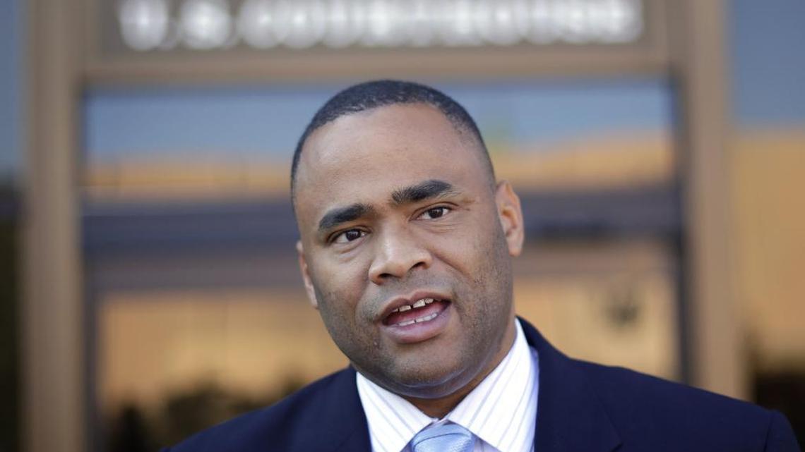 U.S. Rep. Marc Veasey, D-Texas, talks to the media outside of the U.S. Courthouse, July 14, 2014, in San Antonio. Veasey officially launched the Blue Collar Caucus in Congress this week.