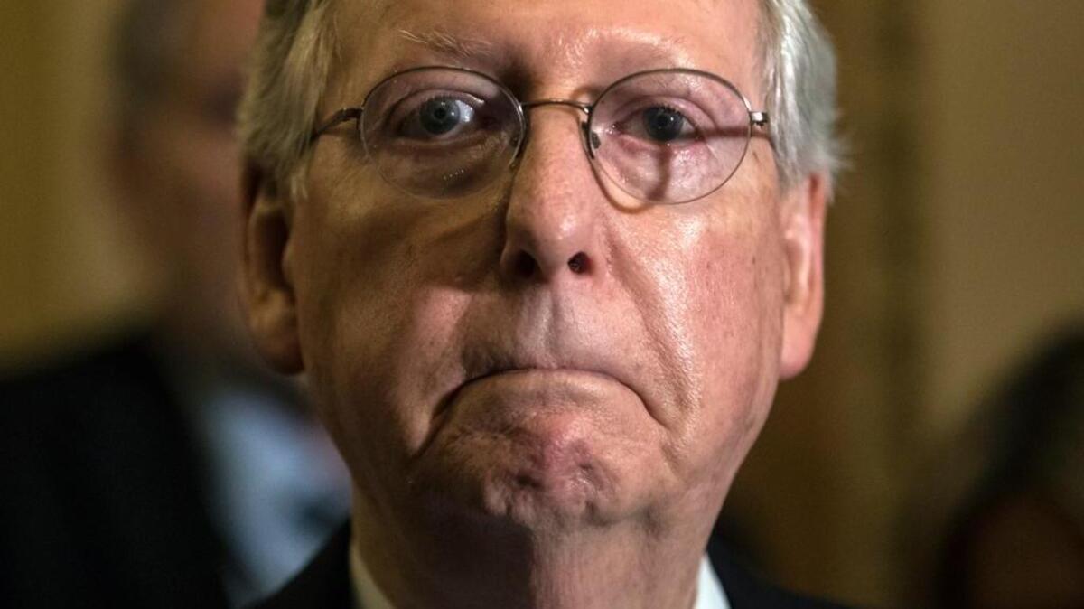 Senate Majority Leader Mitch McConnell, R-Ky., tells reporters he is delaying a vote on the Republican health care bill while GOP leadership works toward getting enough votes, at the Capitol in Washington, Tuesday, June 27, 2017. In a bruising setback, Senate Republican leaders are delaying a vote on their prized health care bill until after the July 4 recess, forced to retreat by a GOP rebellion that left them lacking enough votes to even begin debating the legislation, two sources said Tuesday.