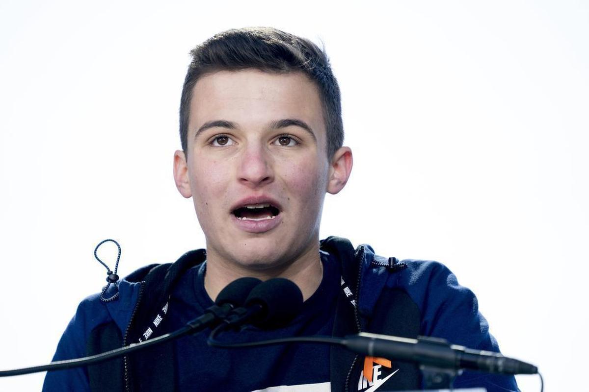 Cameron Kasky, a survivor of the mass shooting at Marjory Stoneman Douglas High School in Parkland, Fla., speaks during the "March for Our Lives" rally in support of gun control in Washington, Saturday, March 24, 2018.