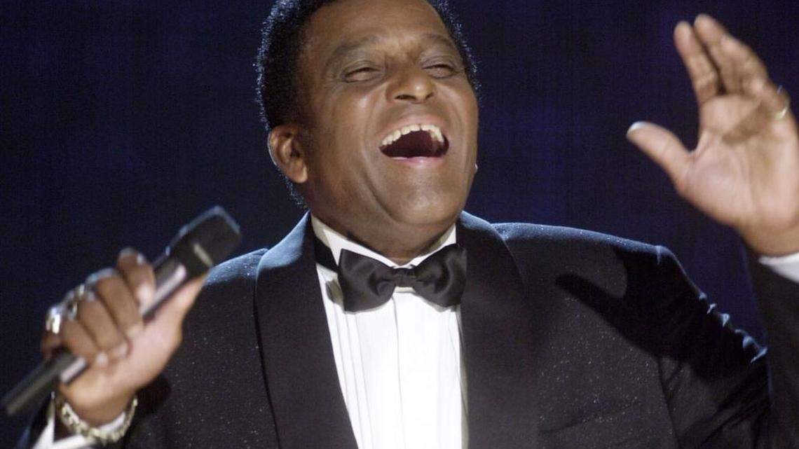 Charley Pride performs during his induction into the Country Music Hall of Fame at the Country Music Association Awards show on Wednesday, Oct. 4, 2000 at the Grand Ole Opry House in Nashville, Tenn.