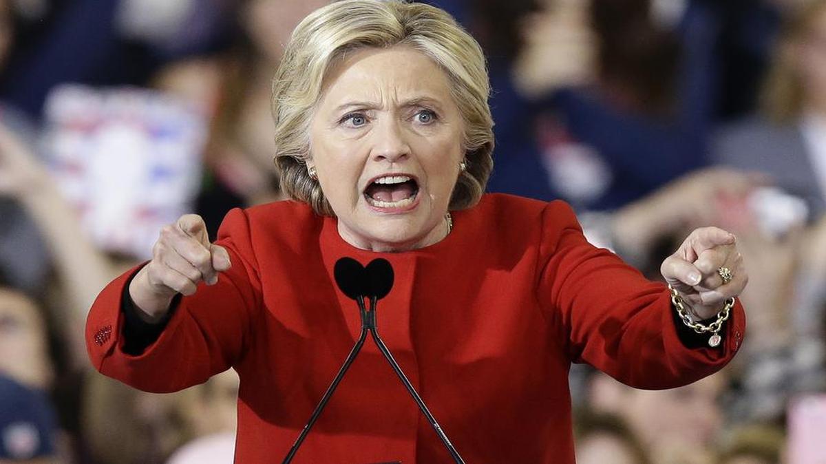 Democratic presidential candidate Hillary Clinton speaks during a campaign rally in Raleigh, N.C., Tuesday, Nov. 8, 2016. Republican House members who represent districts won by Clinton are having a tough time with decision on a GOP plan to repeal Obamacare.