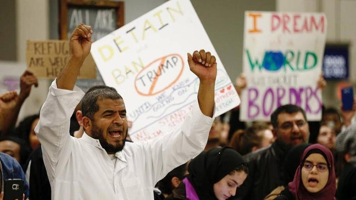 Protestors stayed at DFW Airport until 3 a.m. Sunday, protesting President Trump's executive order.