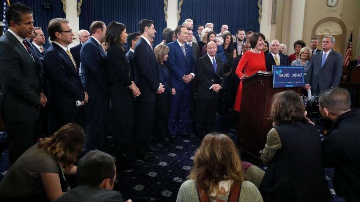 Rep. Cathy McMorris Rodgers, R-Wash., speaks at the podium during a news conference announcing GOP tax legislation. The tax overhaul could play a big role in the 2018 election.