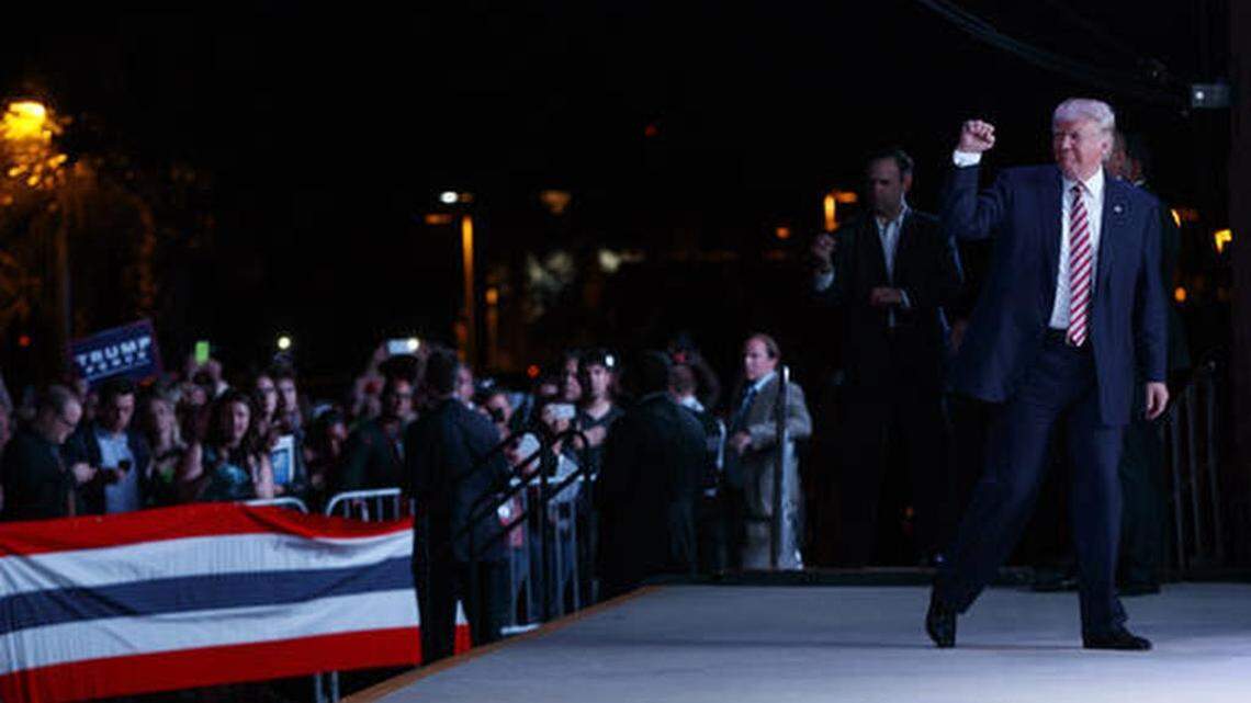 Republican presidential candidate Donald Trump pumps his fist during a campaign rally, Tuesday, Oct. 11, 2016, in Panama City, Fla.