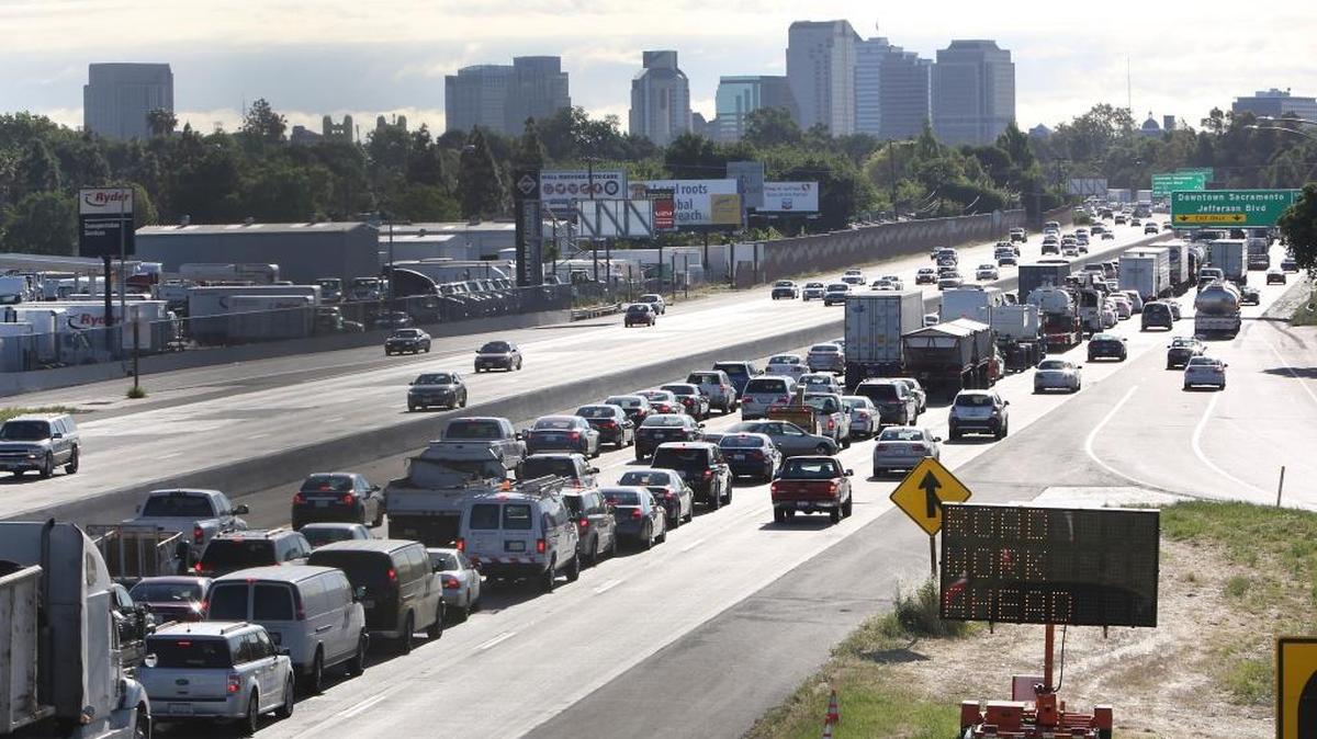 California’s senators are attacking an anticipated move by the Environmental Protection Agency to revoke the state's waiver allowing stronger auto pollution standards than the federal government. In this April 22, 2014, file photo, drivers entering Sacramento on Highway 50 come to a near-standstill as traffic backs up in West Sacramento, Calif.
