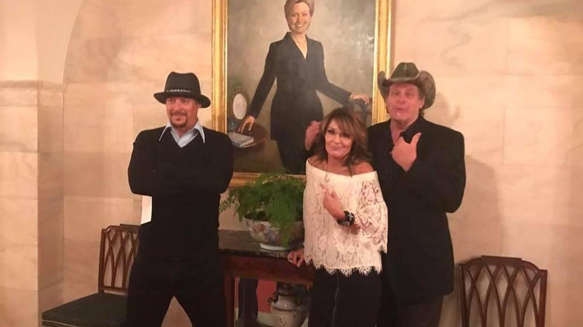 Kid Rock, Sarah Palin and Ted Nugent posed in front of Hillary Clinton’s official portrait at the White House on Wednesday.
