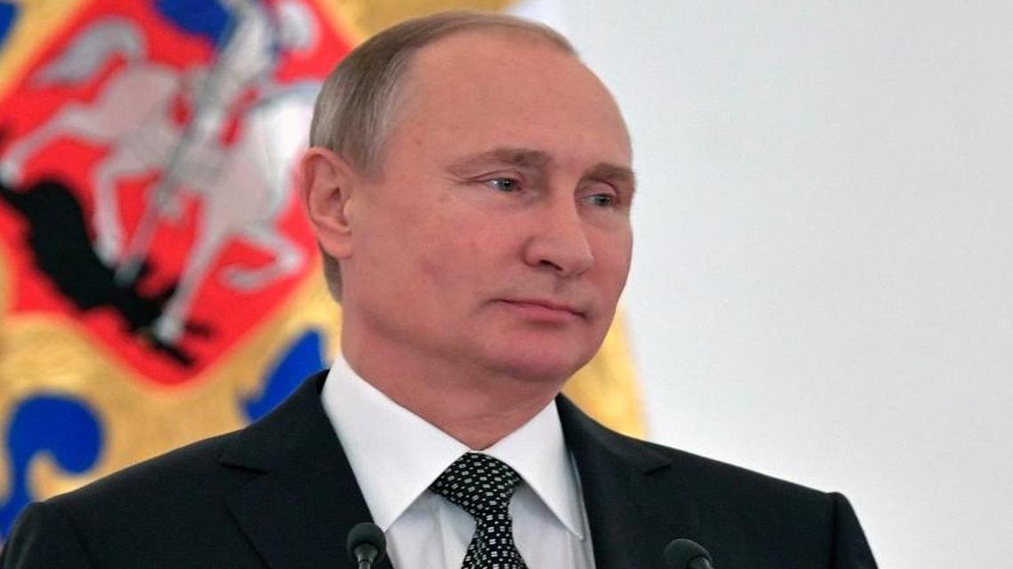 Russian President Vladimir Putin speaks at a reception marking Heroes of the Fatherland Day in the Kremlin in Moscow, Russia, Friday, Dec. 9, 2016. Heroes of the Fatherland Day is a holiday in tribute of the military.