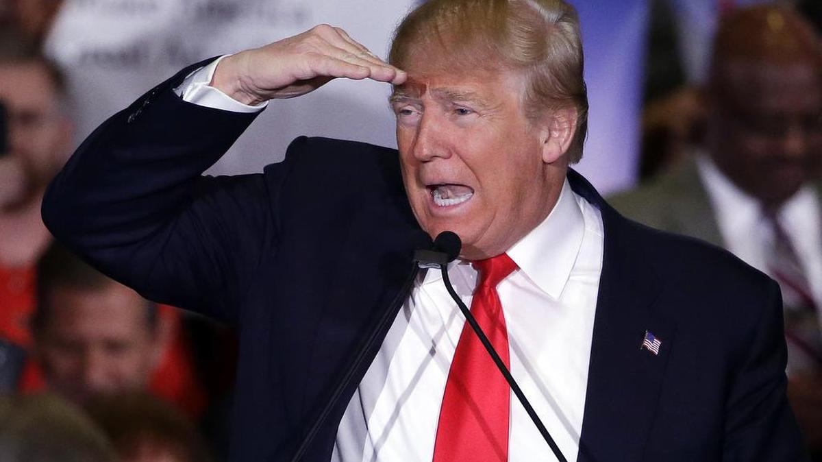 In this Feb. 23, 2016, file photo, Republican presidential candidate Donald Trump looks out onto the crowd during a rally in Reno, Nev.