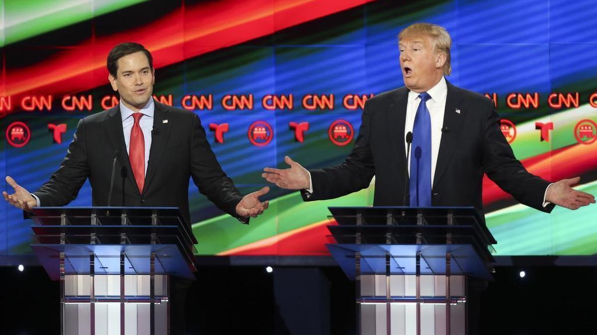 Republican presidential candidates, Sen. Marco Rubio, R-Fla, left, and businessman Donald Trump argue while answering a question during the Republican Presidential Primary Debate at the University of Houston Thursday, Feb. 25, 2016, in Houston.