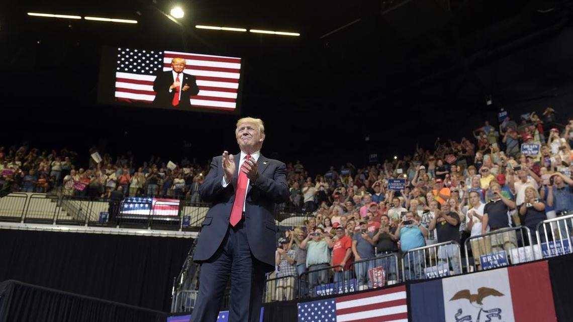 President Donald Trump arrives on stage to speak at the U.S. Cellular Center in Cedar Rapids, Iowa, Wednesday, June 21, 2017. He remains very popular in this first-in-the-nation caucus state.