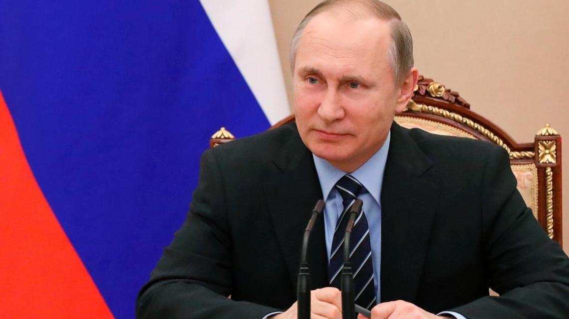 Russian President Vladimir Putin chairs a Security Council meeting in Moscow.