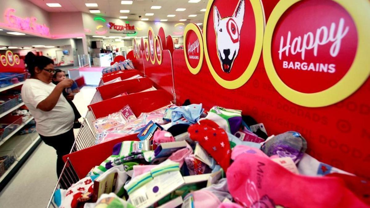 In this May 4, 2010, file photo, a customer shops at a Target store in Mountain View, Calif. Target CEO Brian Cornell testified Tuesday that a proposed border adjustment tax, essentially a tax on imported goods, would “hit those families hard” by raising prices up to 20 percent.