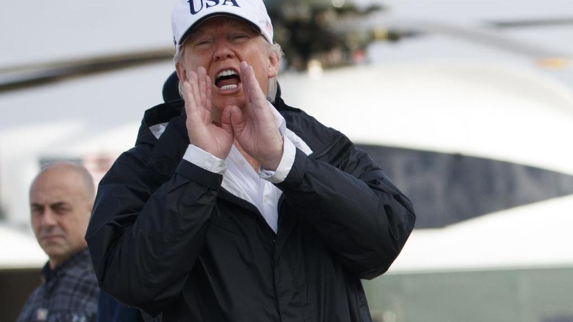 President Donald Trump responds to a reporters question as he boards Air Force One with first lady Melania Trump, not shown, for a trip to Florida to meet with first responders and people impacted by Hurricane Irma, Thursday, Sept. 14, 2017, in Andrews Air Force Base, Md. His recent dealings with Democrats on other issues, like immigration, come as no surprise to longtime Republican critics.