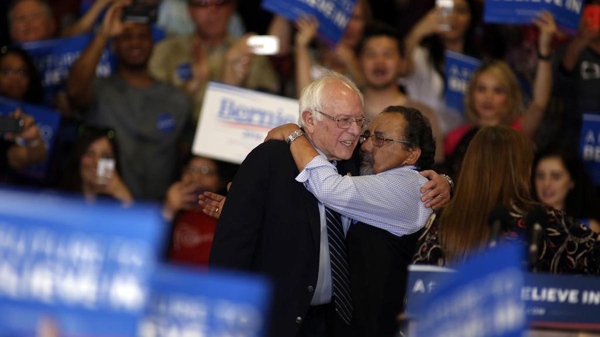 U.S. Rep. Raul M. Grijalva, D-Arizona, introduces Democratic presidential candidate Bernie Sanders to a crowd at the Future To Believe in Rally at Bonanza High School on Valentine’s Day in Las Vegas. The gym was filled with supporters.
