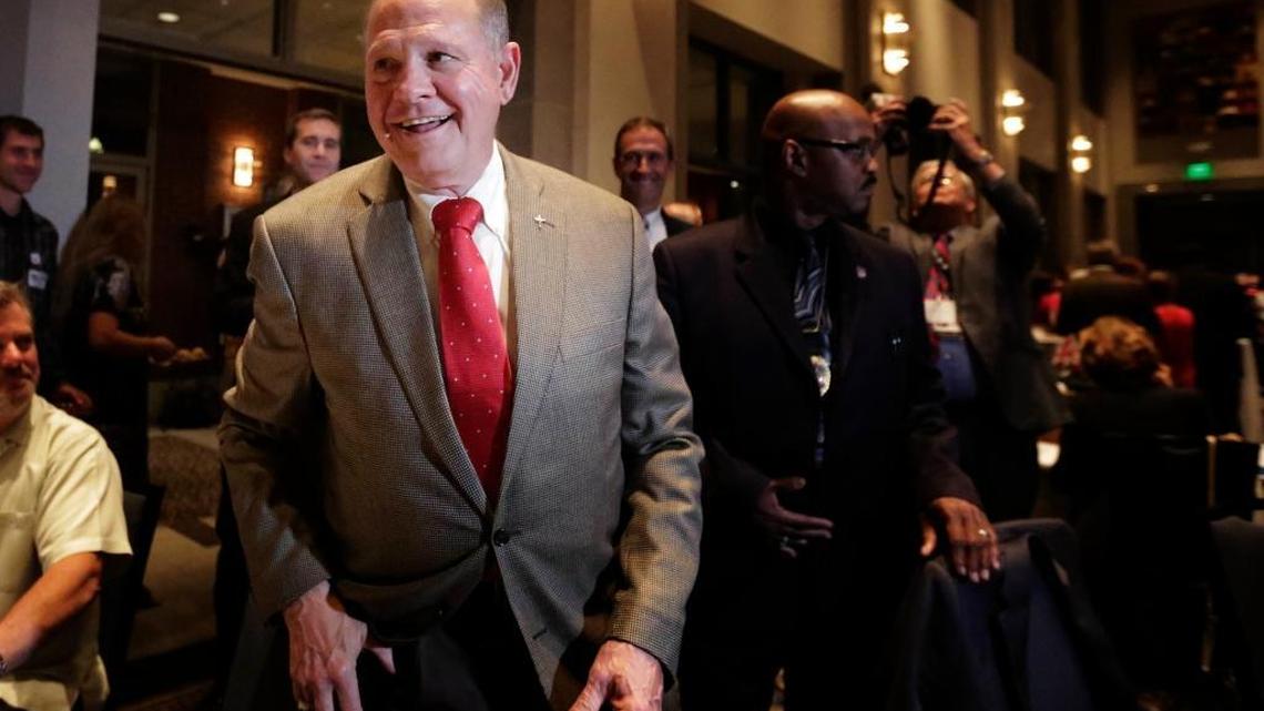 FILE- In this Sept. 26, 2017, file photo, former Alabama Chief Justice and U.S. Senate candidate Roy Moore greets supporters before his election party in Montgomery, Ala. Allegations of Moore’s sexual misconduct are shaking up the Alabama special Senate election.