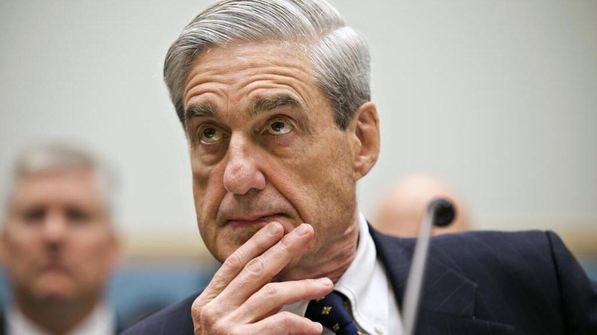 Former FBI Director Robert Mueller testifies on Capitol Hill in Washington on June 13, 2013, as the House Judiciary Committee held an oversight hearing on the FBI. Mueller’s team of lawyers investigating potential coordination between Russia and the Trump campaign is still growing, but its early composition reveals a breadth of experience in criminal law and in following the money.