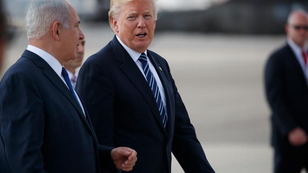 Israeli Prime Minister Benjamin Netanyahu walks President Donald Trump to board Air Force One, on Tuesday, May 23, 2017, in Jerusalem.