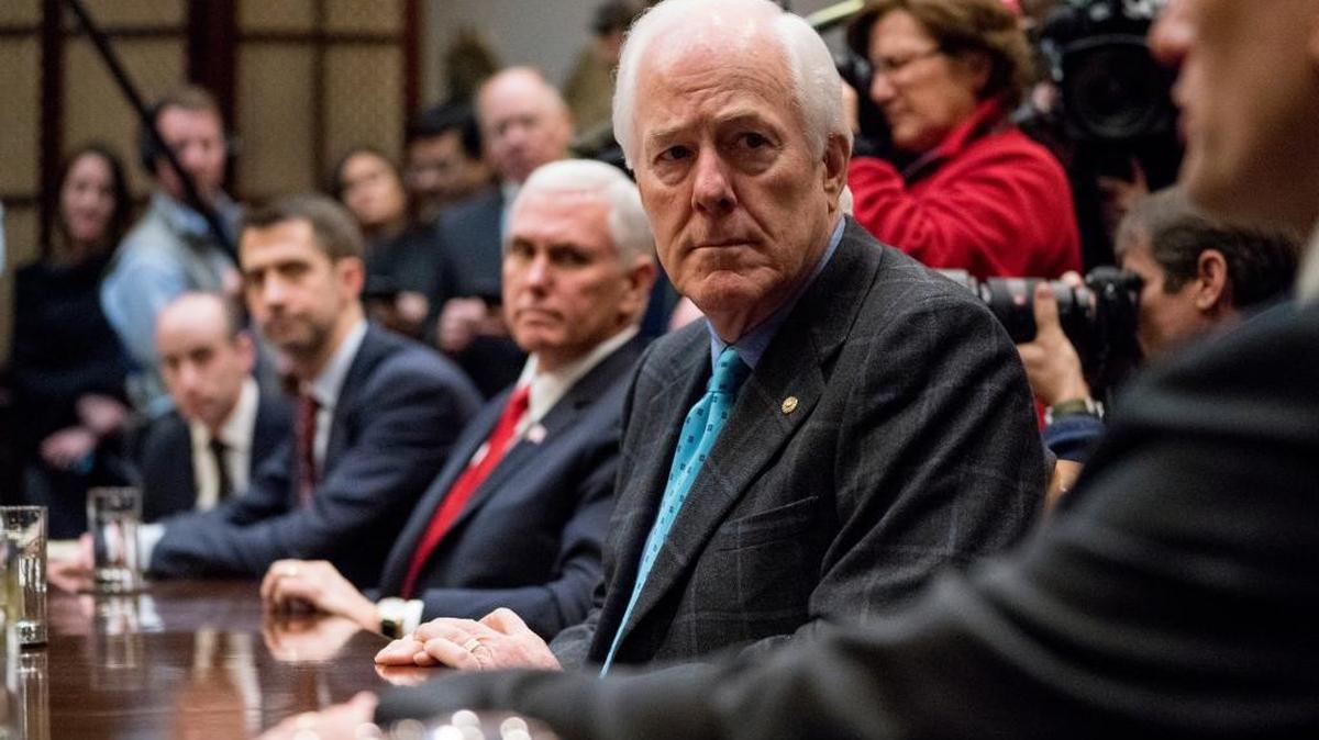 From left, President Donald Trump's White House Senior Adviser Stephen Miller, Sen. Tom Cotton, R-Ark., Vice President Mike Pence and Senate Majority Whip Sen. John Cornyn, R-Texas. attend a meeting with President Donald Trump on immigration in the Roosevelt Room at the White House Thursday.