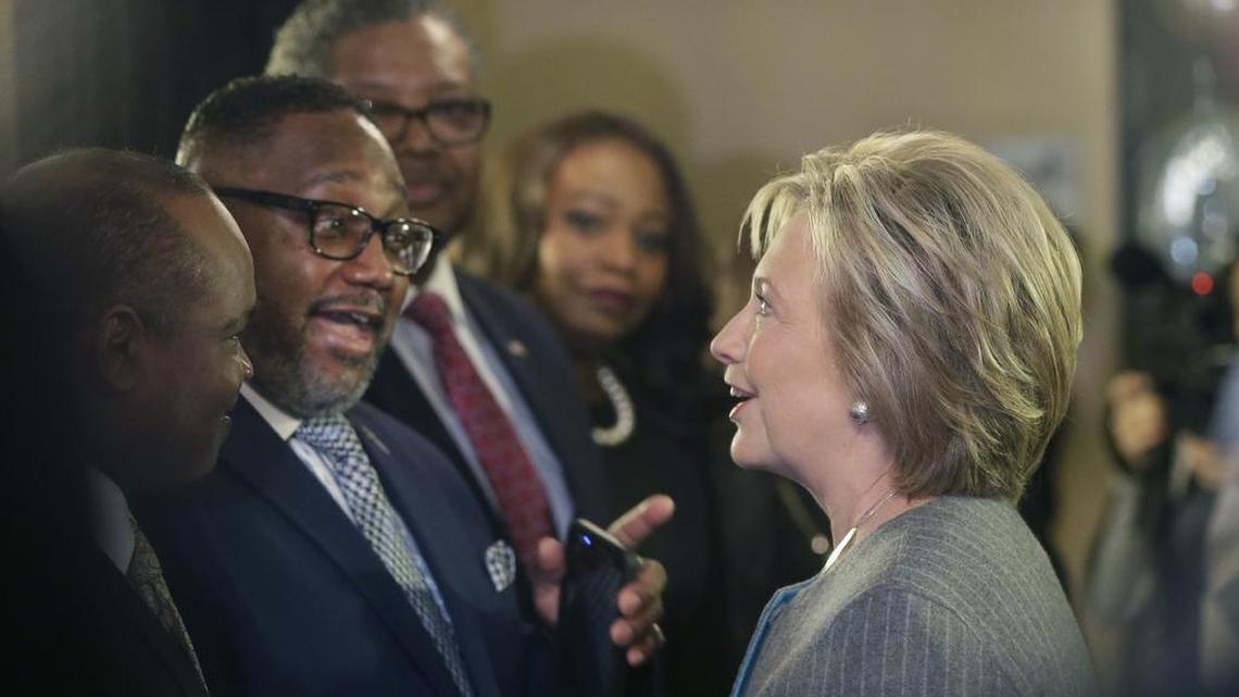 Democratic presidential candidate Hillary Clinton meets with The Rev. Kenneth J. Flowers of the Greater New Mt. Moriah Missionary Baptist Church before speaking with African-American ministers, March 5, 2016, in Detroit.
