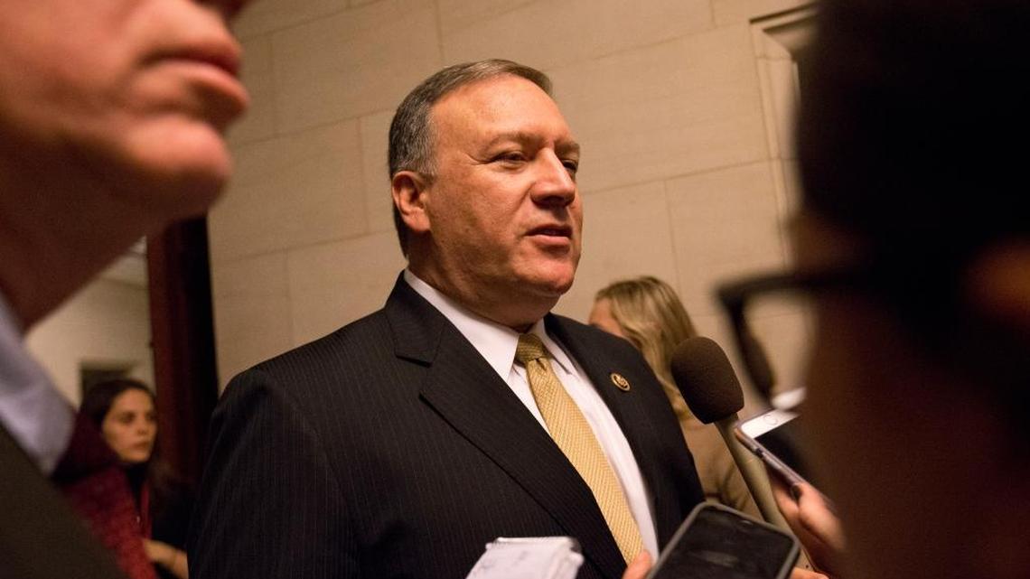 House Benghazi Committee member Rep. Mike Pompeo, R-Kan., talks to reporters on Capitol Hill on Oct. 22, 2015, during a break in the committee's hearing.