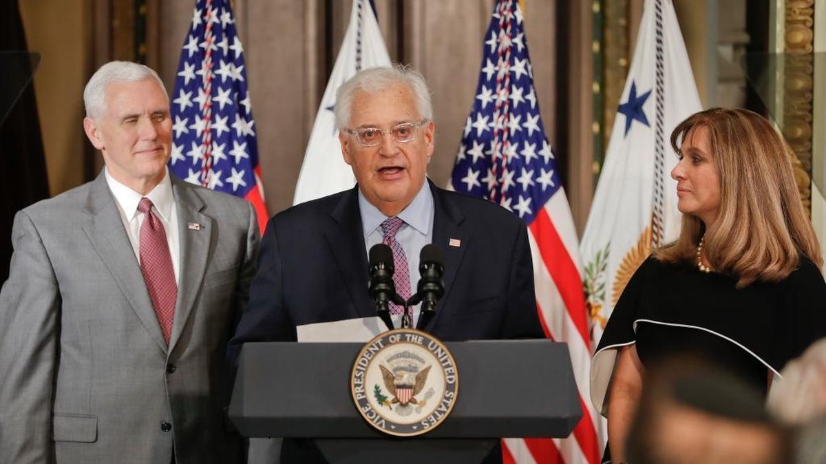 U.S. Ambassador to Israel David Friedman, center, accompanied by his wife, Tammy, speaks after Vice President Mike Pence administered the oath of office, Wednesday, March 29, 2017, in Washington. Friedman and the Trump family have had a close relationship for years.