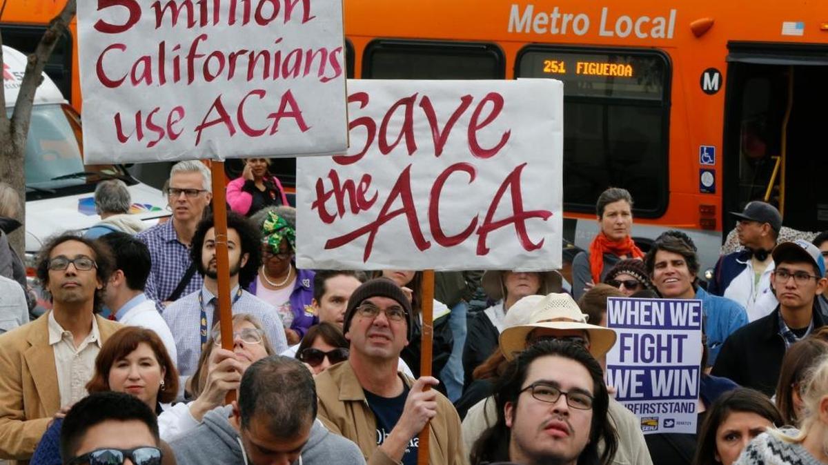 Californians join health care workers at a January rally to save the Affordable Care Act in Los Angeles. The Republican-controlled House of Representatives passed legislation to dismantle the ACA on Thursday, but the GOP claims its bill protects people with pre-existing medical conditions.