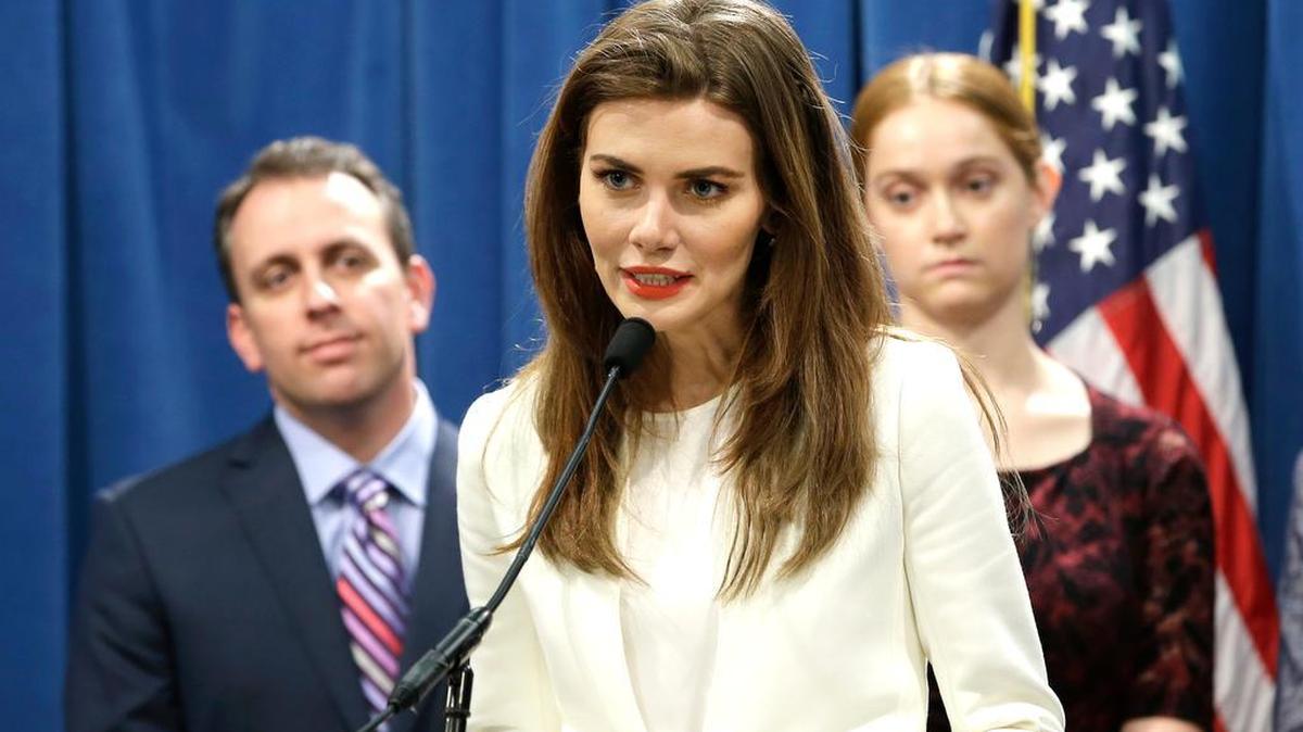 Former fashion model Nikki DuBose, center, discusses some of the health issues models face during a news conference Wednesday in Sacramento, Calif. DuBose, and model Madeline Hill, right, joined others in supporting proposed legislation by Assemblyman Marc Levine, D-San Rafael, left, that would, among other things, require all modeling agencies be licensed with the labor commissioner and clarify that models are statutory employees.