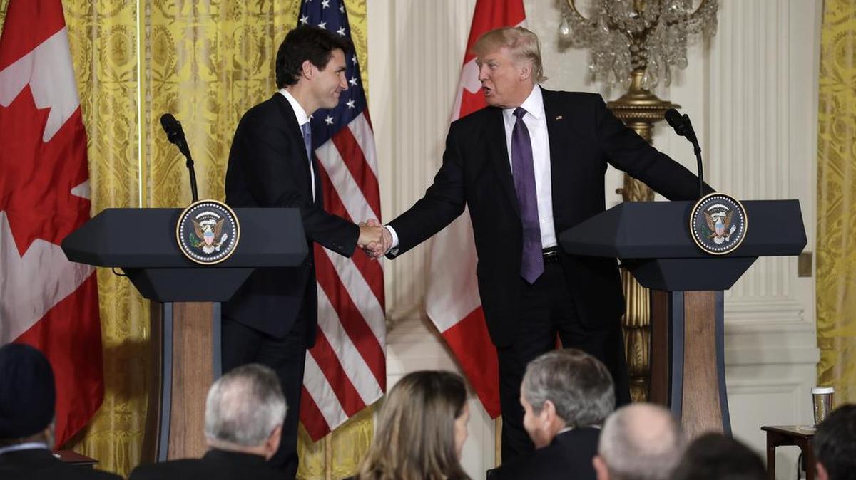 President Donald Trump shakes hands with Canadian Prime Minister Justin Trudeau during a joint news conference in the East Room of the White House in Washington, Monday, Feb. 13, 2017.
