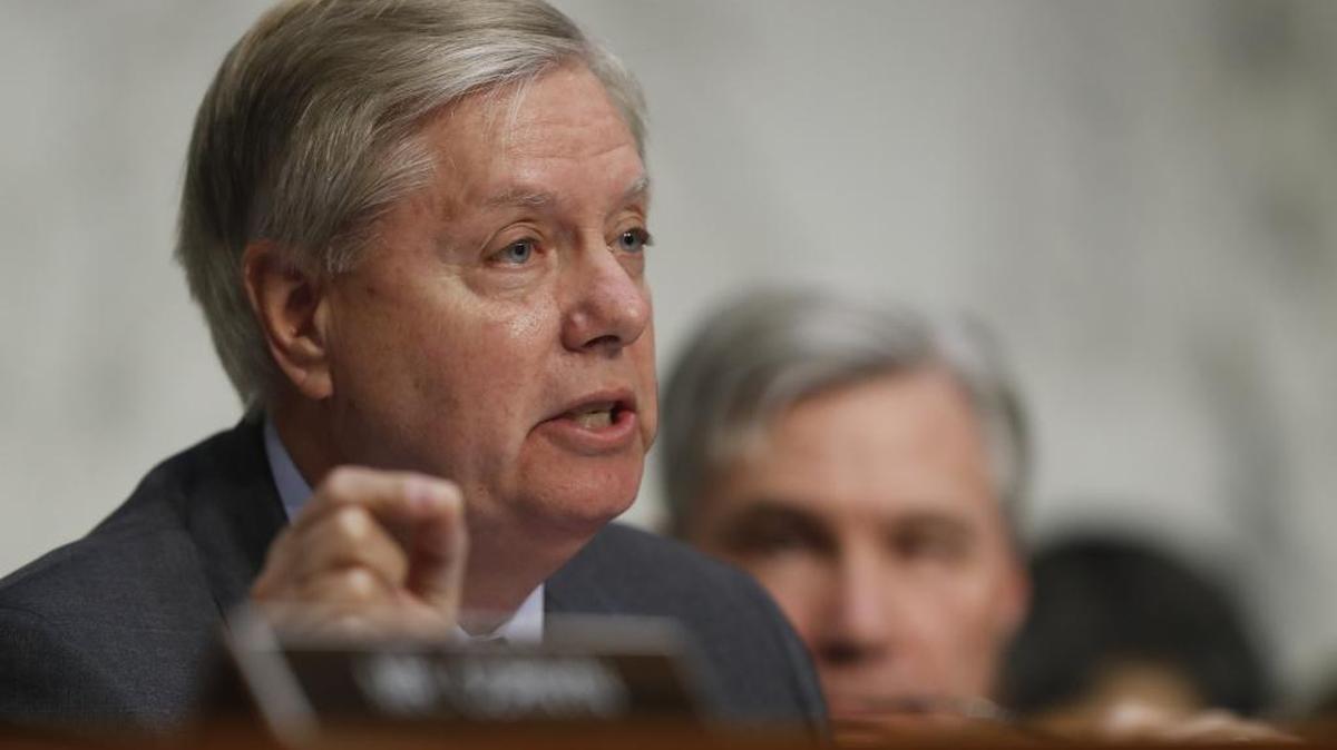 Senate Judiciary subcommittee on Crime and Terrorism Chairman Sen. Lindsey Graham, R-S.C., questions former acting Attorney General Sally Yates, and former National Intelligence Director James Clapper, on Capitol Hill in Washington, Monday, May 8, 2017, during the subcommittee's on Crime and Terrorism hearing: "Russian Interference in the 2016 United States Election." Committee ranking member Sen. Sheldon Whitehouse, D-R.I., listens at right.