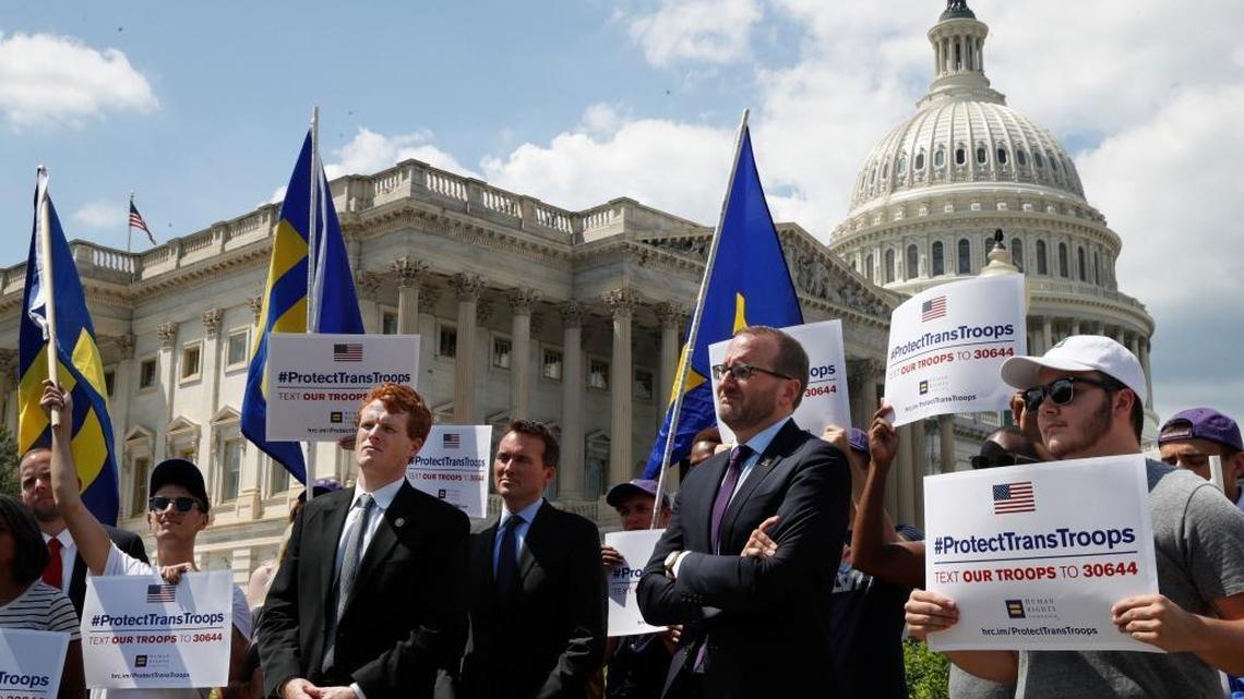 Rep. Joe Kennedy, D-Mass., third from right, listens during an event in support of transgender members of the military, Wednesday, July 26, 2017, on Capitol Hill in Washington, after President Donald Trump said he wants transgender people barred from serving in the U.S. military "in any capacity," citing "tremendous medical costs and disruption."